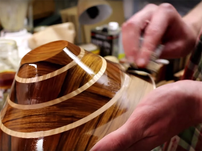 For this bowl, I used a few seal coats of shop-made shellac, followed by a wiping varnish.