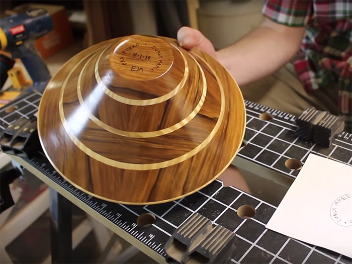 It's been my habit to sign the bottom of my turnings with my initials, date, and woods used.