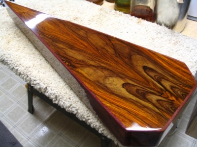 Cocobolo (bookmatched) with a buffed, glossy shellac finish